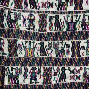 Tribal embroidered table runner white over purple, black, yellow, pink